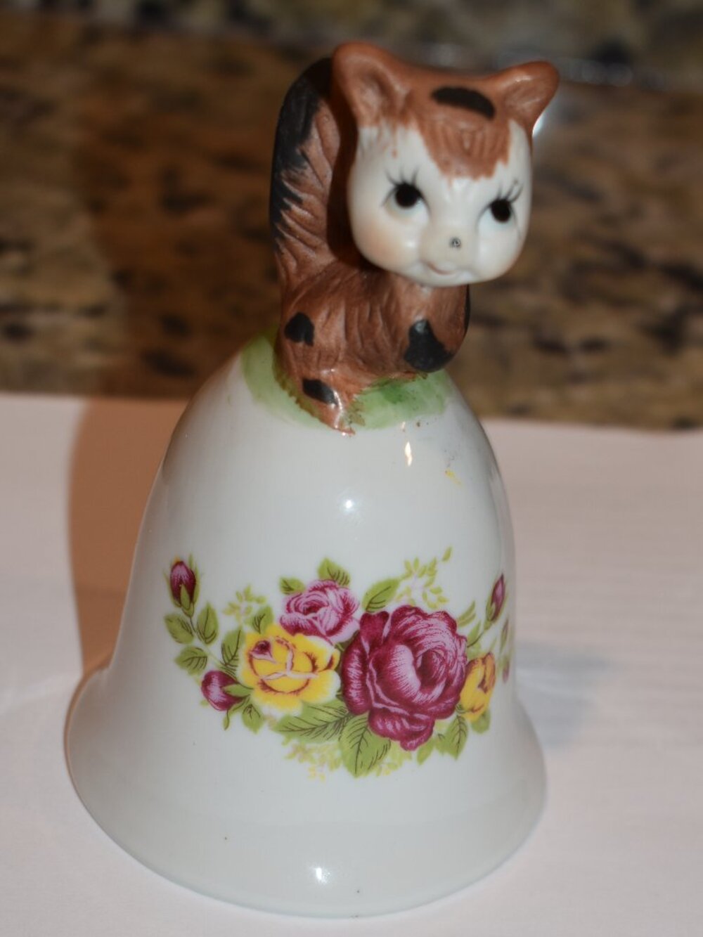 Beautiful Bell with Raccoon on Top